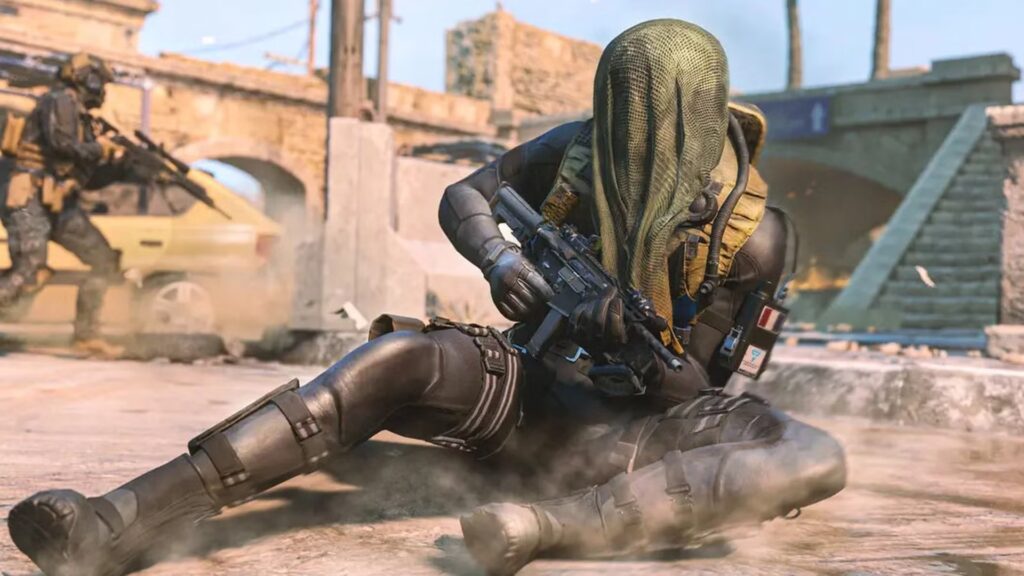 Image of Call of Duty player sliding while holding assault rifle